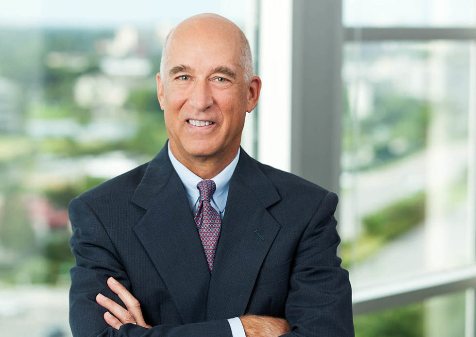 Gittings on location executive closeup male portrait by the office window